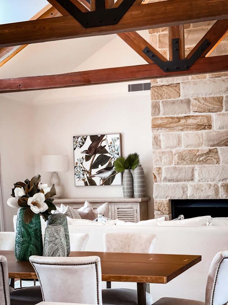 Textured feature wall of stone above fireplace