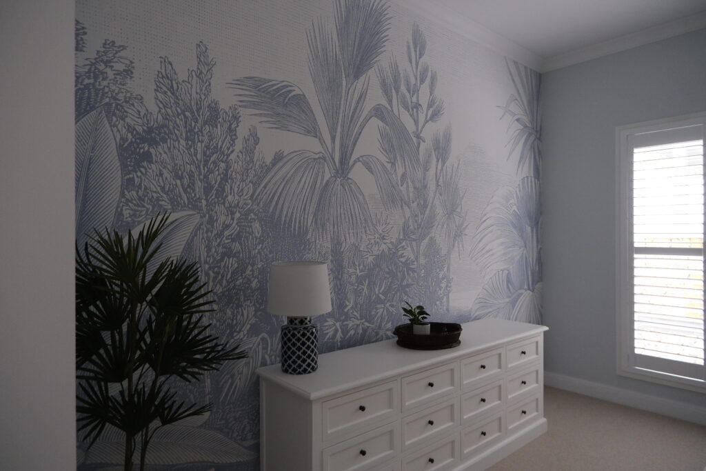 neutral tone feature wallpaper that compliments the walls meeting